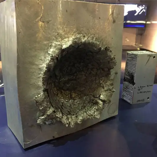 Effects of a Small Space Debris Particle Moving at 15,000mph