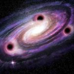 3 supermassive black holes — each weighing more than 90 million Suns located in a single galaxy