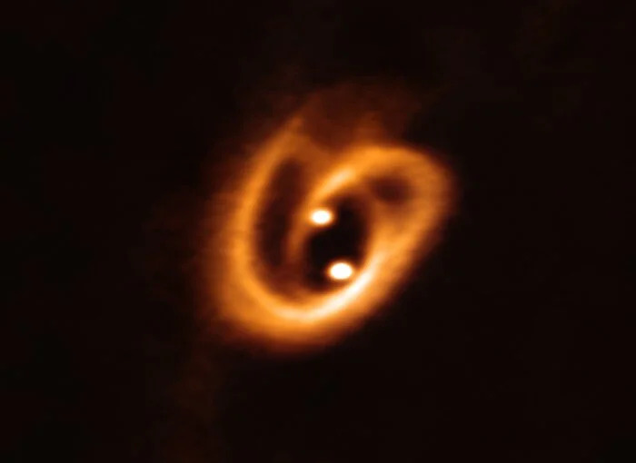 Astronomers captured stunning real image of binary stars and their twisted planet-forming disks